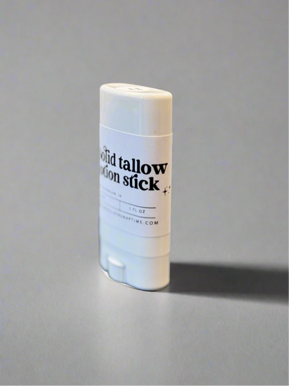 Solid tallow lotion stick